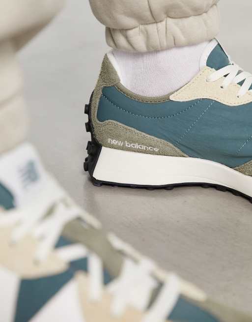 New Balance 327 trainers in grey and light blue