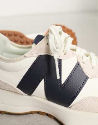 new balance 327 trainers in white and navy