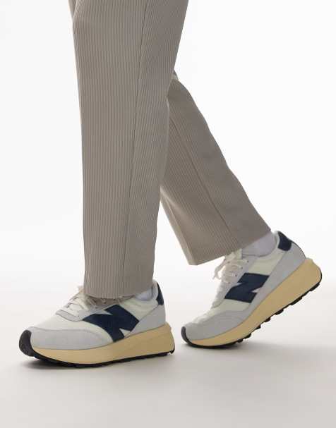 New Balance – 370 – Sneaker in Weiß und Marineblau - view 1