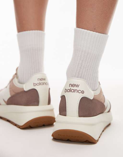 New Balance 370 trainers in brown, 4 of 5