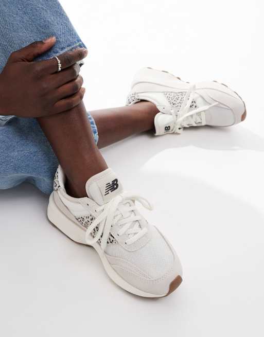 New Balance 370 trainers in off white and leopard, 3 of 5