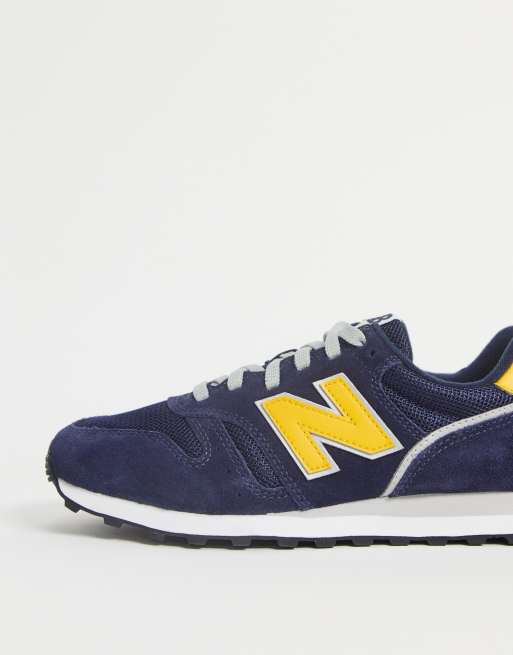 New Balance 373 Baskets Bleu marine et jaune