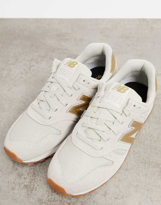 New balance blanche et hot sale doré