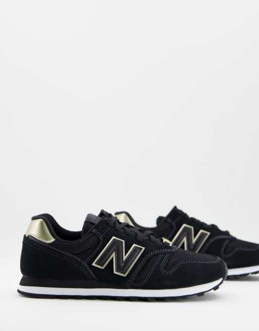 New Balance 373 Baskets Noir et or