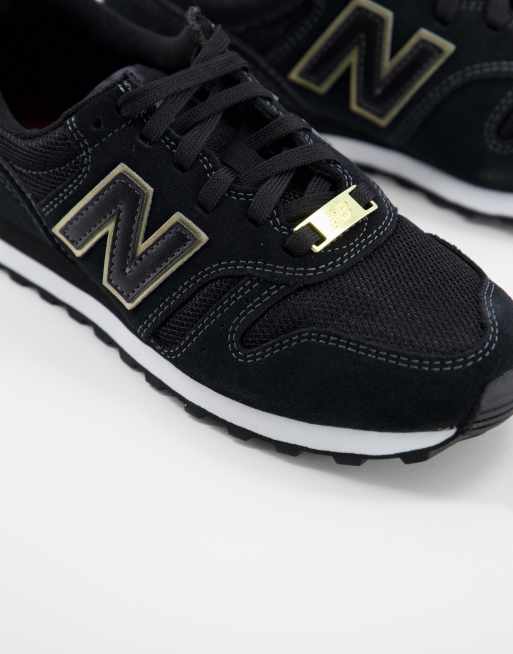 New Balance 373 Baskets Noir et or