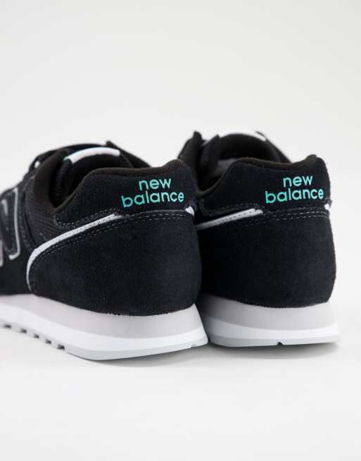 New Balance 373 sneakers in black aqua blue ASOS