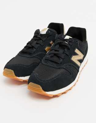 new balance black and gold 373