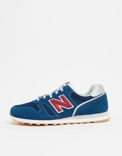 New Balance 373 sneakers in blue and red