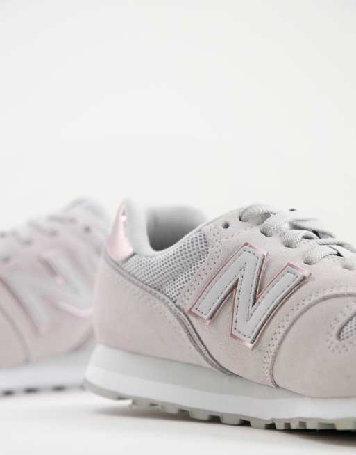 New Balance 373 sneakers in grey and pink ASOS