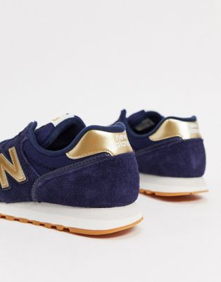 New Balance 373 sneakers in navy and 