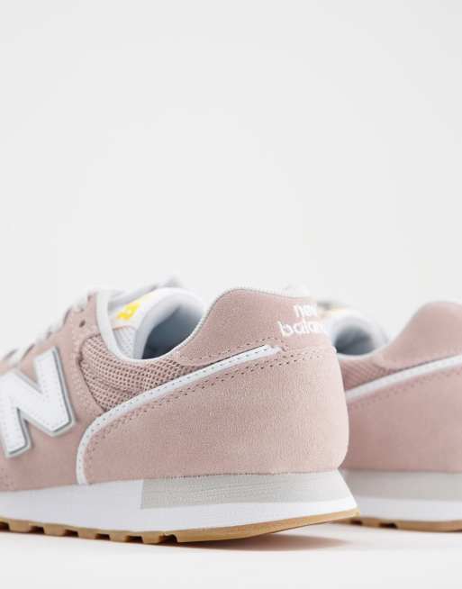 New Balance 373 Sneakers in roze en wit ASOS