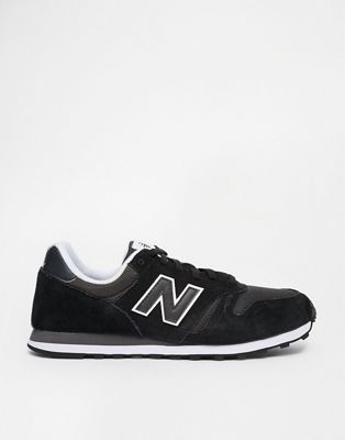 new balance black & white 373 suede trainers