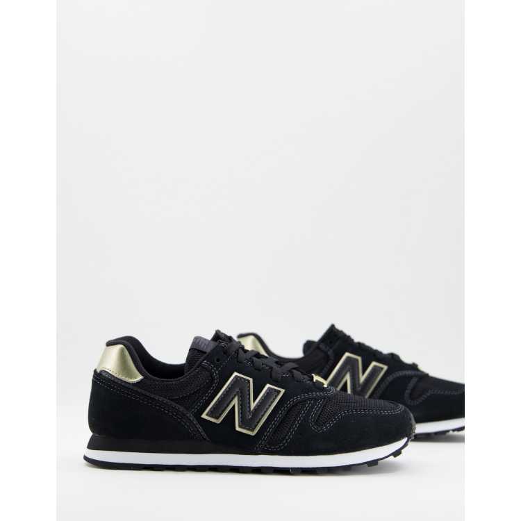 coser mensaje Violeta New Balance 373 trainers in black and gold | ASOS