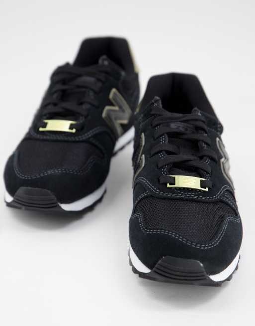 New balance black and gold outlet trainers