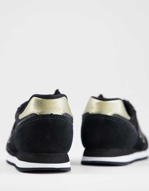 New balance 373 black hotsell and gold