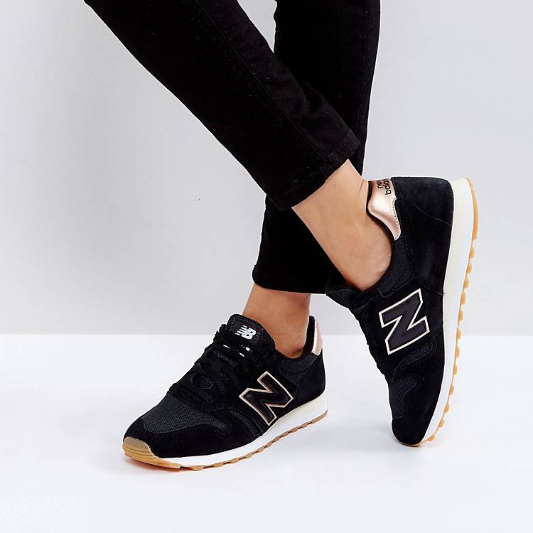 Namaak klein Jumping jack New Balance 373 Trainers In Black And Gold | ASOS