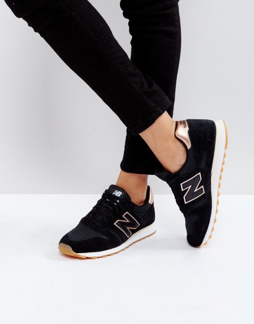 New Balance 373 Trainers In Black And Gold