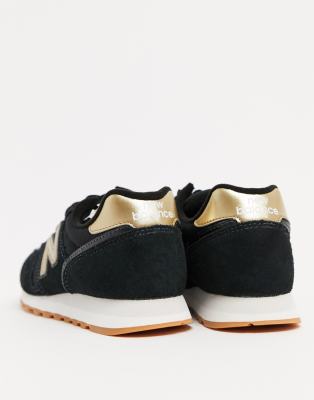 new balance trainers black and gold