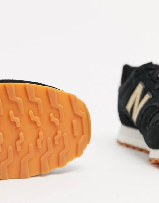 New balance 373 black on sale gold