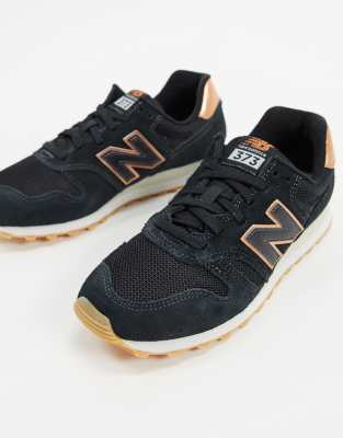 black new balance with rose gold