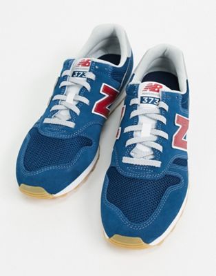 New Balance 373 trainers in blue and 