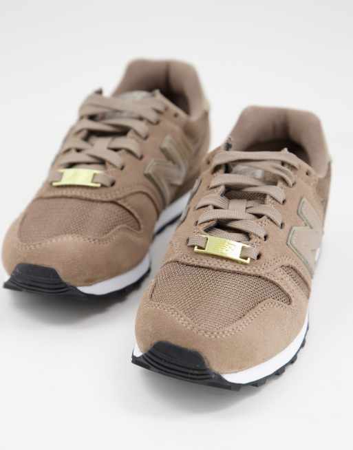 Brown and 2025 gold new balance