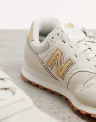 new balance gold trainers