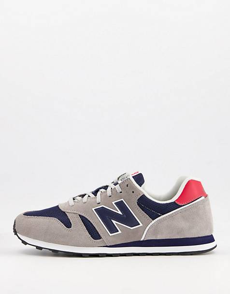 New Balance 373 trainers in grey and navy