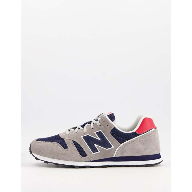 New Balance 373 trainers in grey and navy