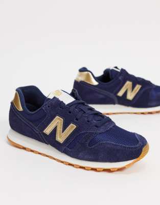 new balance yellow 373 metallic trainers