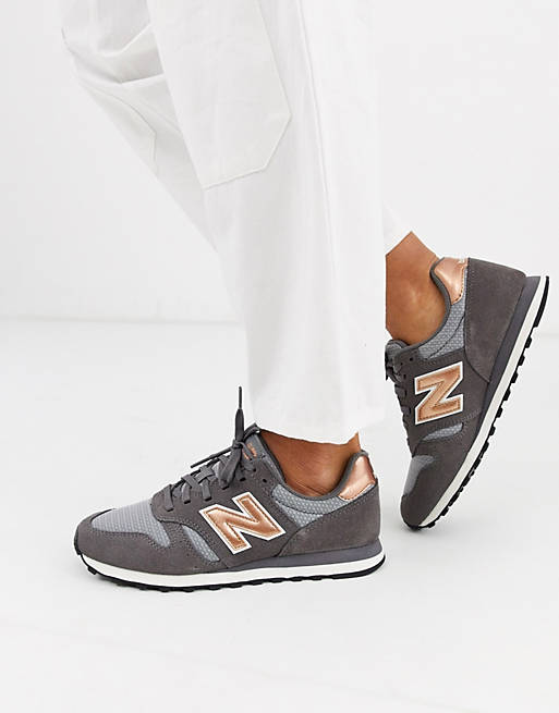 New Balance 373 trainers in rose gold