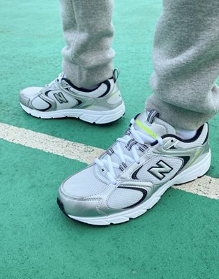 New Balance 408 trainers in silver and lime