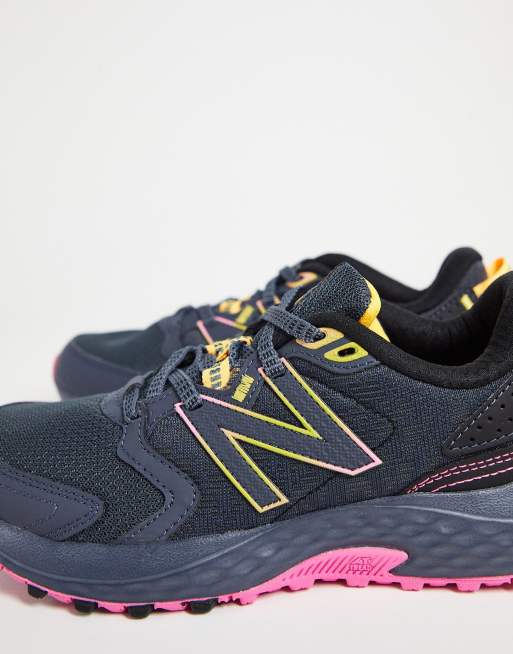 New Balance 410 Baskets Noir et rose