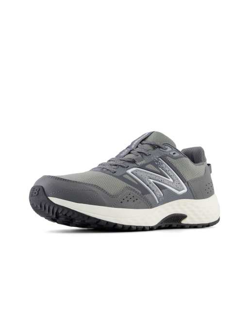 New Balance 410 running trainers in dark grey ASOS