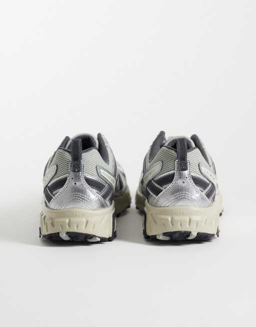 New Balance 410 trainers in grey and blue, 4 of 5