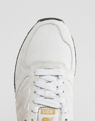 new balance 420 perforated suede trainers in pale grey