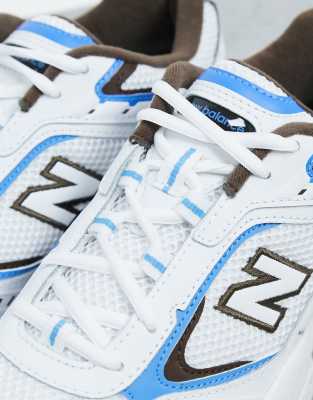 white and light blue trainers