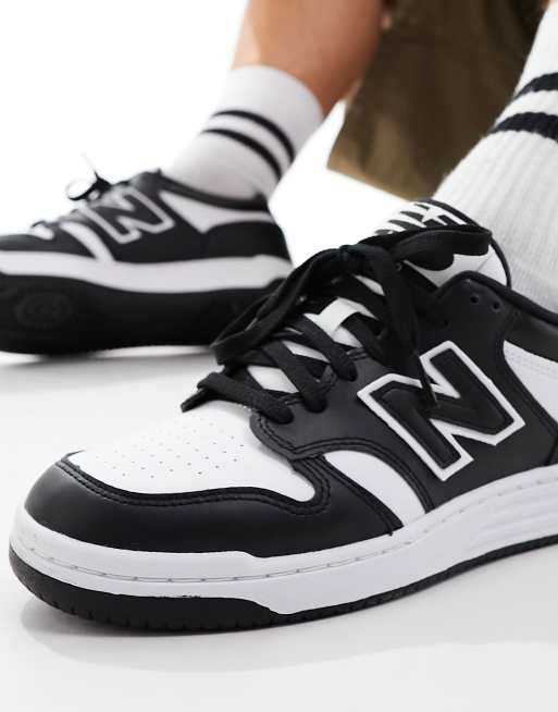 New Balance 480 sneakers in black and white