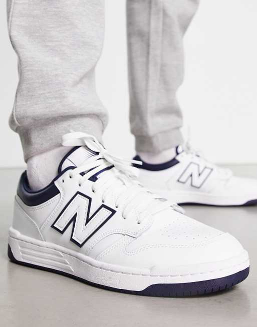 New Balance 480 sneakers in white and navy