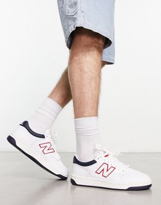 New Balance 480 trainers in white and navy with red detailing