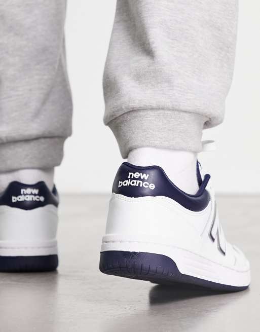 New Balance 480 trainers in white and navy