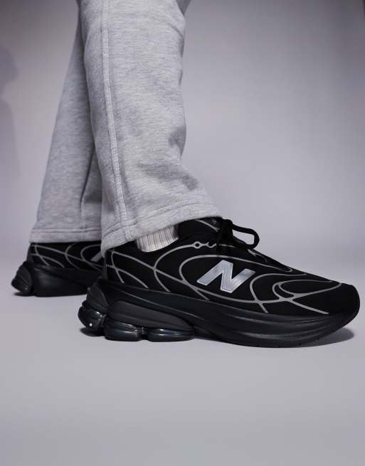 New Balance – 5030 – Svarta och silvermetalliska skor, 3 av 5