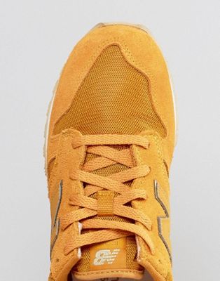 new balance yellow 520 suede trainers