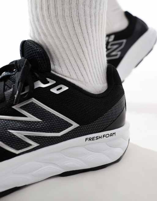 New Balance 520 running trainers in black and white ASOS