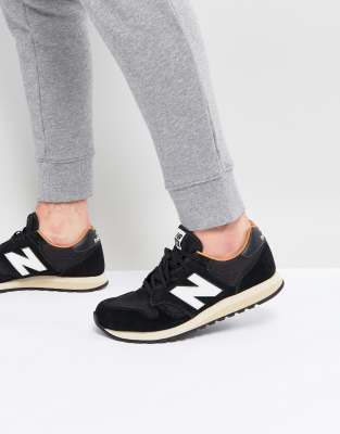 new balance 520 suede trainers in grey