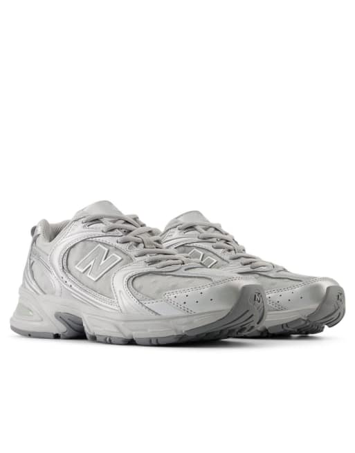 New Balance 530 trainers with polka dot detail in silver grey