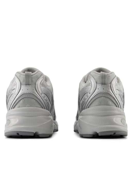 New Balance 530 trainers with polka dot detail in silver grey