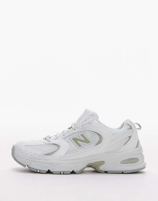 New Balance 530 trainers in white and light green