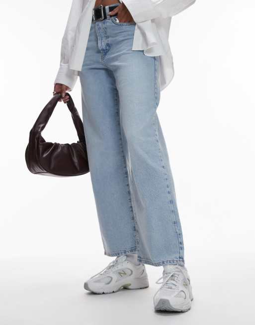 New Balance 530 trainers in white and light green