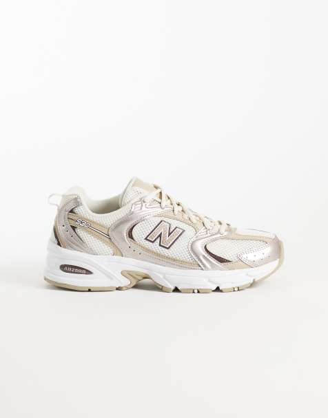 New Balance 530 baskets blanches et bronze métallisé - view 1